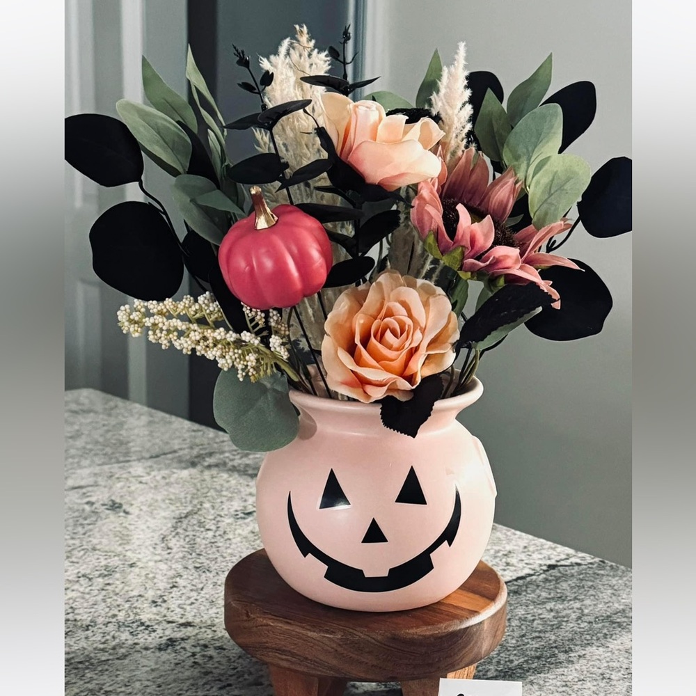 Happy Jack planter with gorgeous flower arrangement .New